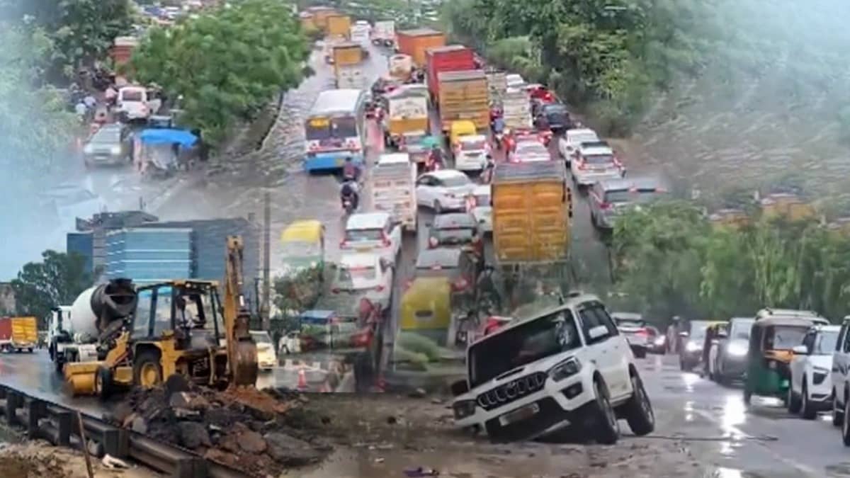 Rainy Day Gridlock: Gurugram Traffic Crawls As Road Cave-In On NH-48 Triggers 8-Km Traffic Nightmare | WATCH